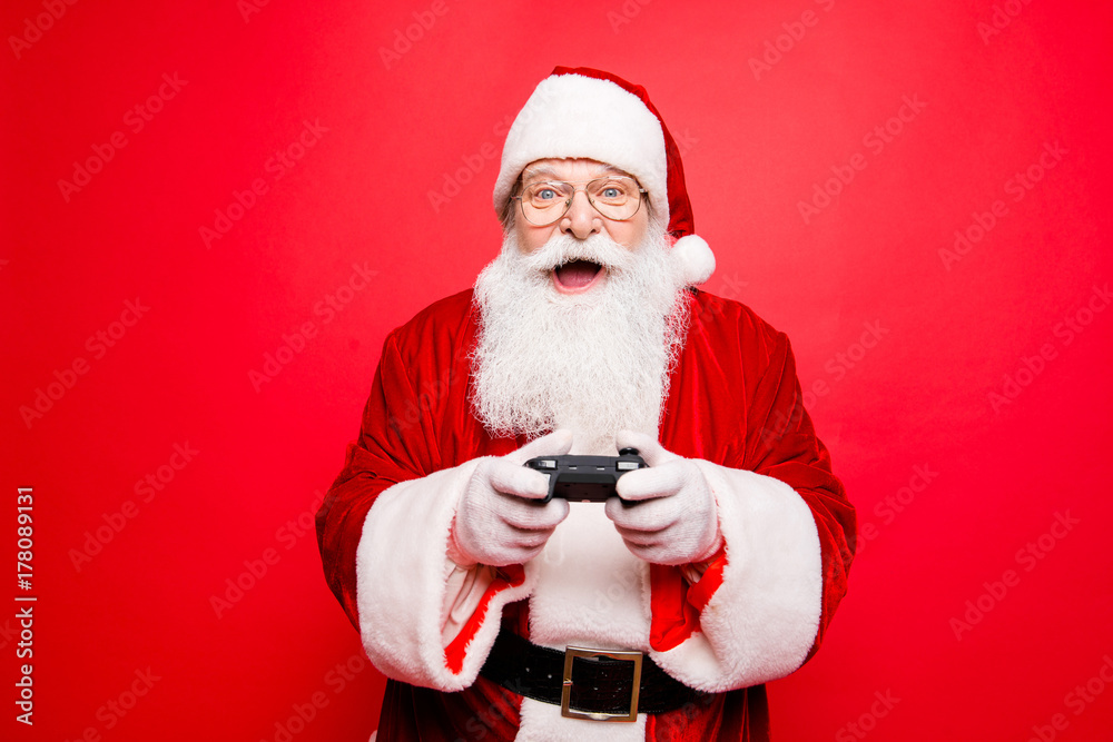 Holly jolly x mas festive noel carefree, chill, entertainment, leisure, tradition time! Funny santa in headwear, costume, black belt, white gloves playing videogames on tv, winning crazy car race