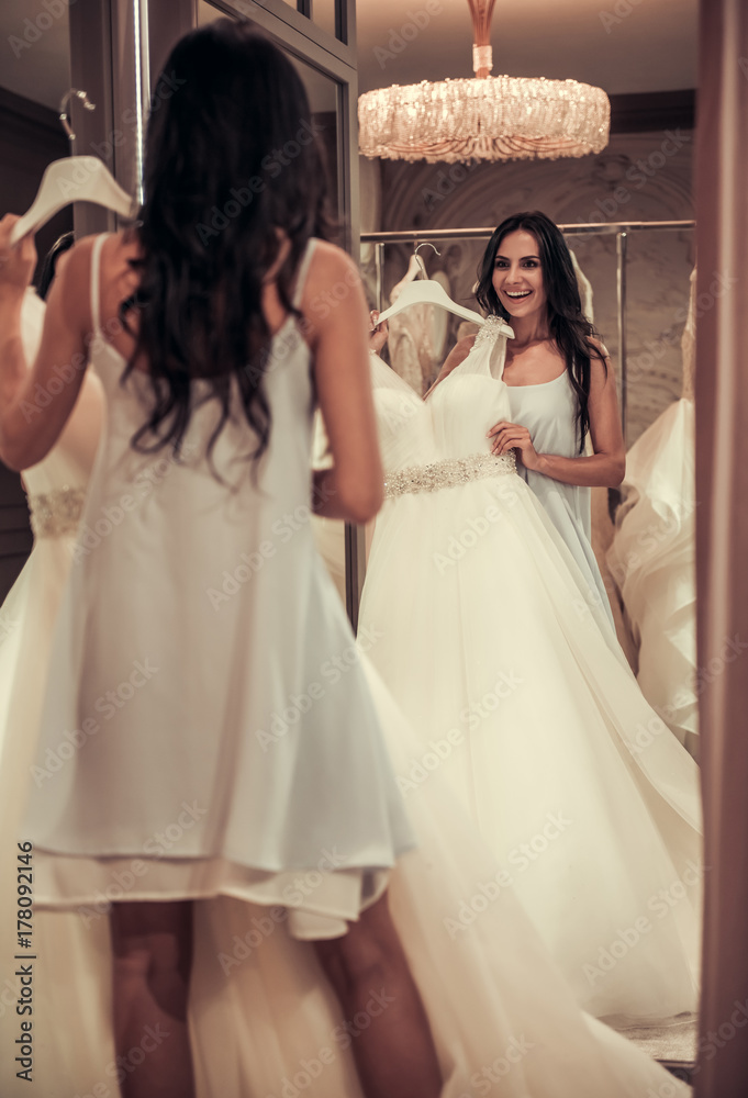 Fototapeta premium Beautiful bride in wedding salon