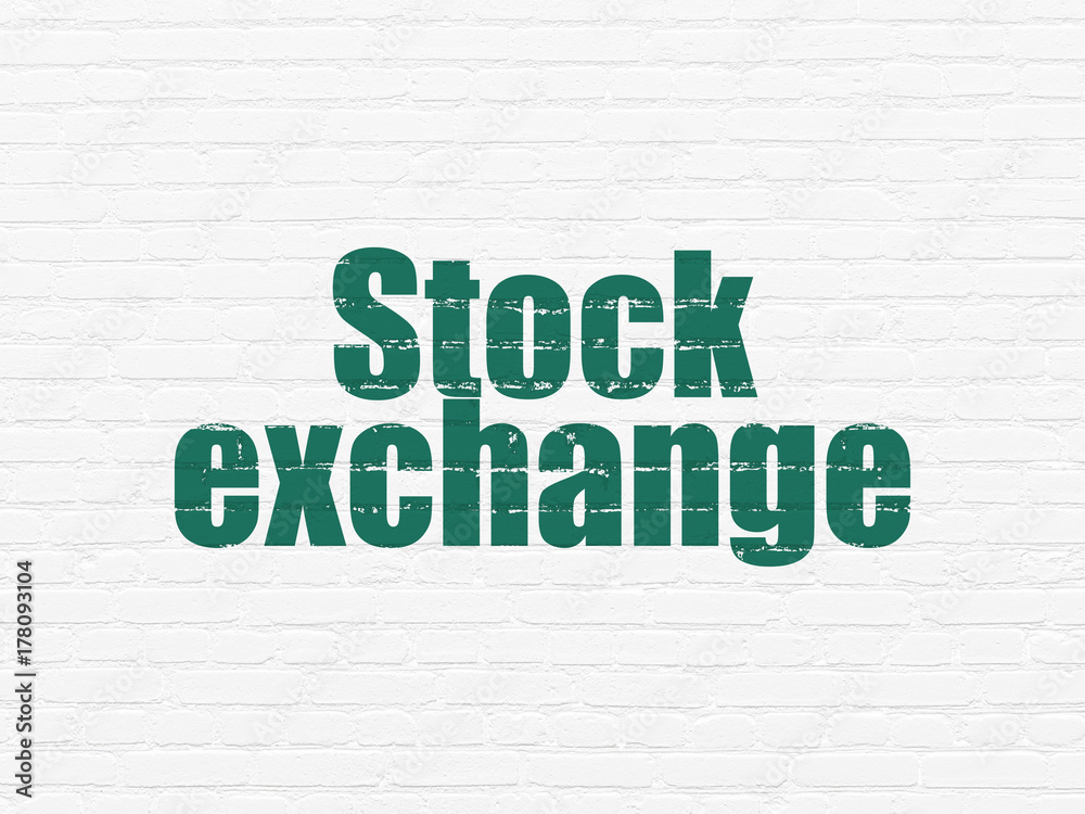 Finance concept: Painted green text Stock Exchange on White Brick wall background Finance concept: Painted green text Stock Exchange on White Brick wall background