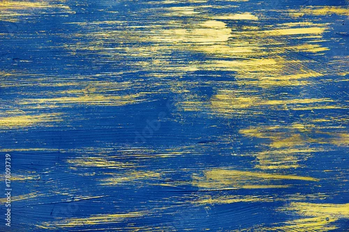 Obraz złota farba na niebieskim tle