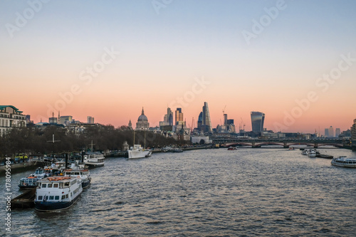 London Skyline from the River Thames at sunset. © jeancuomo