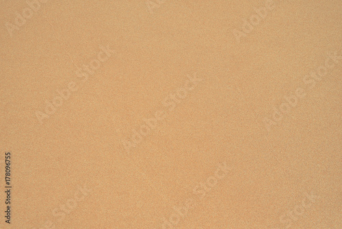 wet sand on the beach, background