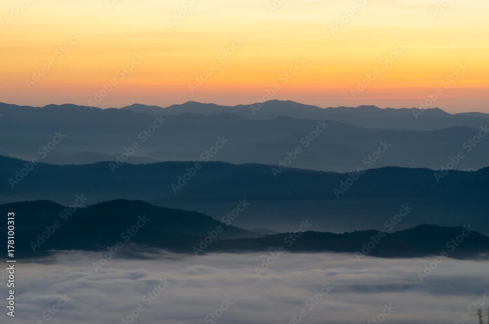 Beautiful clouds and fog among mountain landscape.