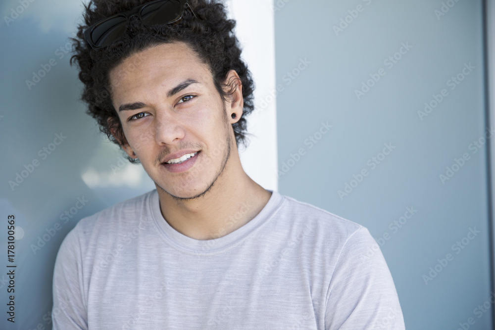 Handsome Young Male With Curly Brown Hair Smiling Handsome Young Male With Curly Brown Hair Smiling