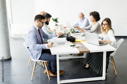 Joyful multiracial business team at work in modern office © BGStock72