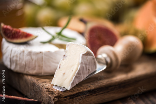 Close view on camemberd cheese slice