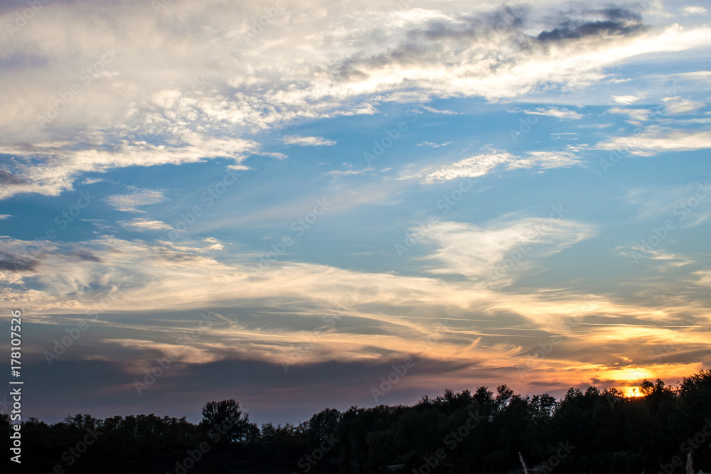 Fototapeta premium Beautiful Autumn Sunset by the forest 