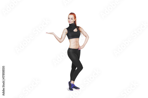 Young Athletic Woman put out Hand to Promote Your Product