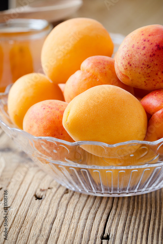 Fresh apricots in glass bowl