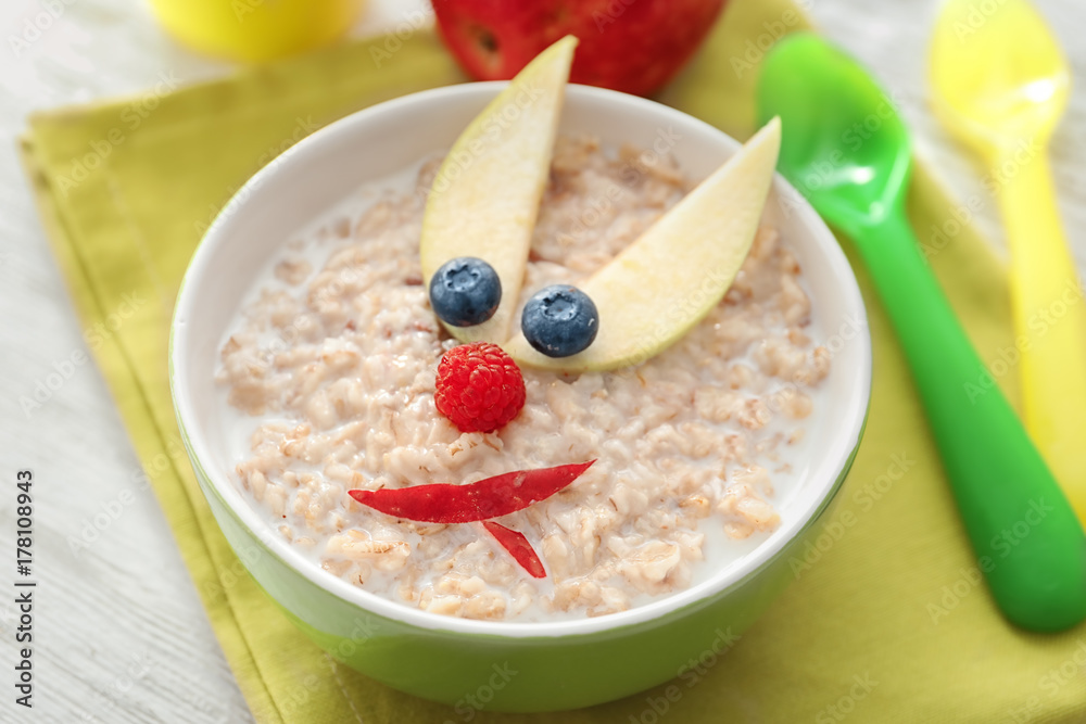 Creative oatmeal for children on table Creative oatmeal for children on table