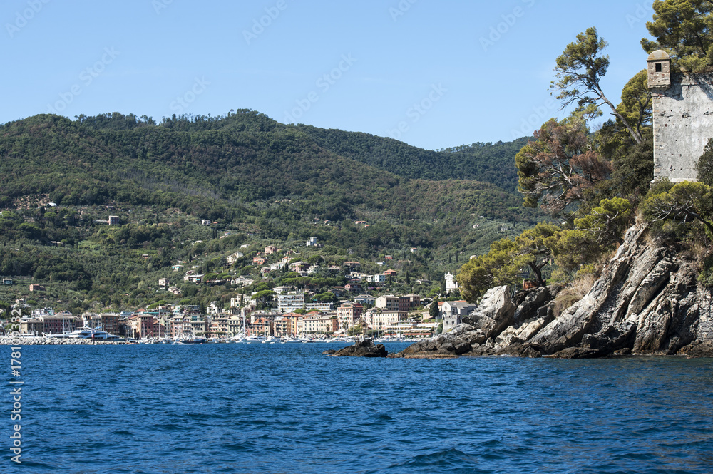 Santa Margherita Ligure, Liguria Italia -  watching the coast from the sea. the Village with the typical architecture of the houses on the harbor.