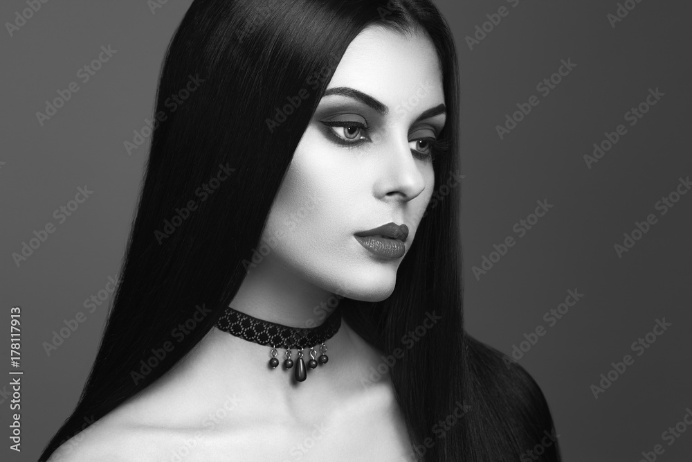 Halloween Vampire Woman portrait. Beautiful Glamour Fashion Sexy Vampire  Lady with Long Dark Hair, Beauty Make Up and Costume Stock Photo | Adobe  Stock