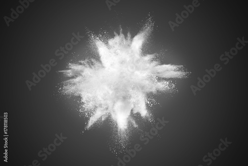 Explosion of white powder isolated on black background.