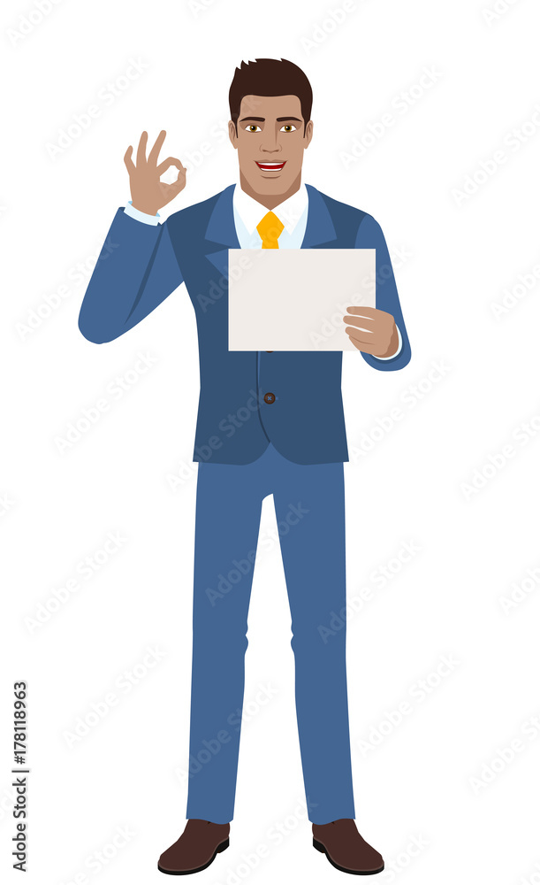 Businessman showing a a paper and show a okay hand sign Businessman showing a a paper and show a okay hand sign