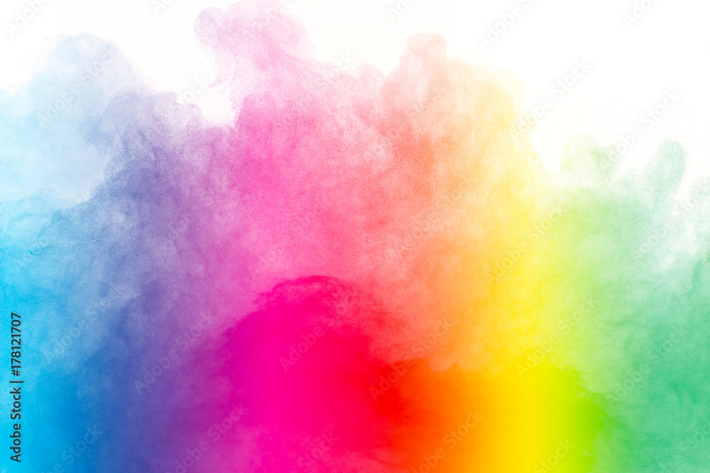 Splash of colorful powder over white background.
