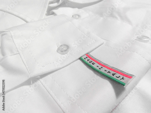 Made in Italy label on white shirt