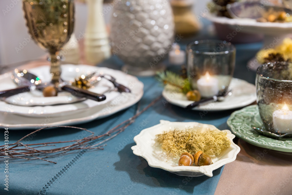 Table decorated with luxury dishes closeup, nobody