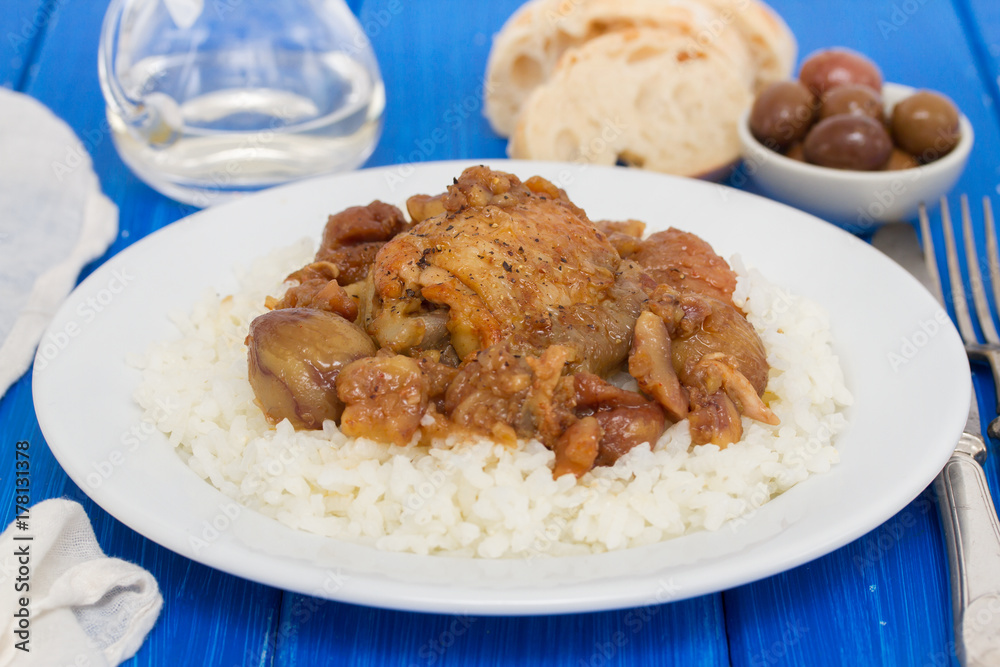 chicken with chestnuts and boiled rice on dish chicken with chestnuts and boiled rice on dish