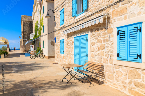 Fotografie Street with traditional coastal restaurants in old town of Primosten, Dalmatia,