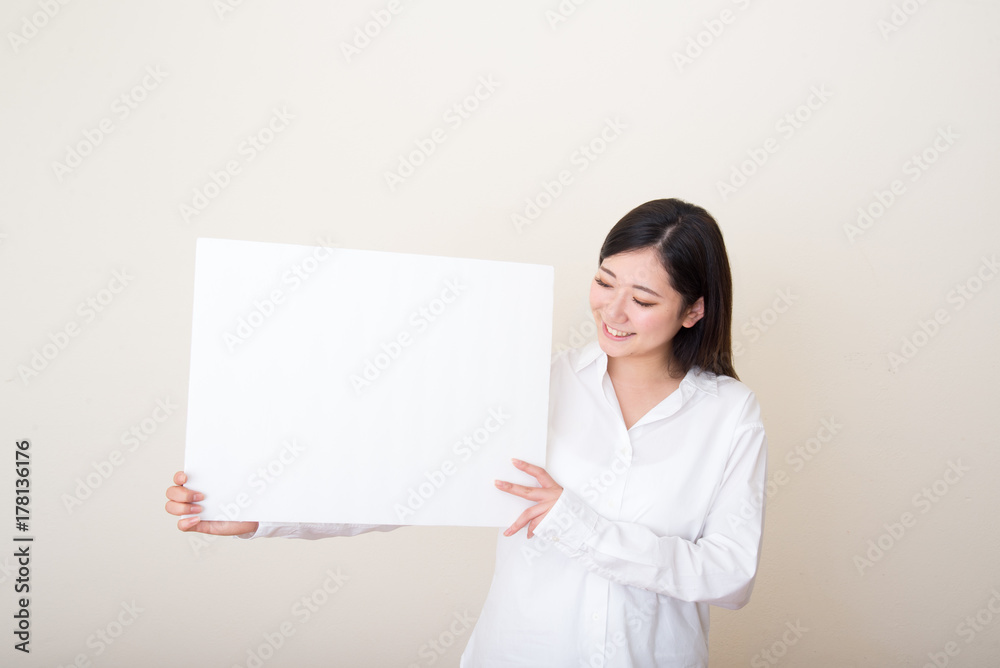young asian woman with white board