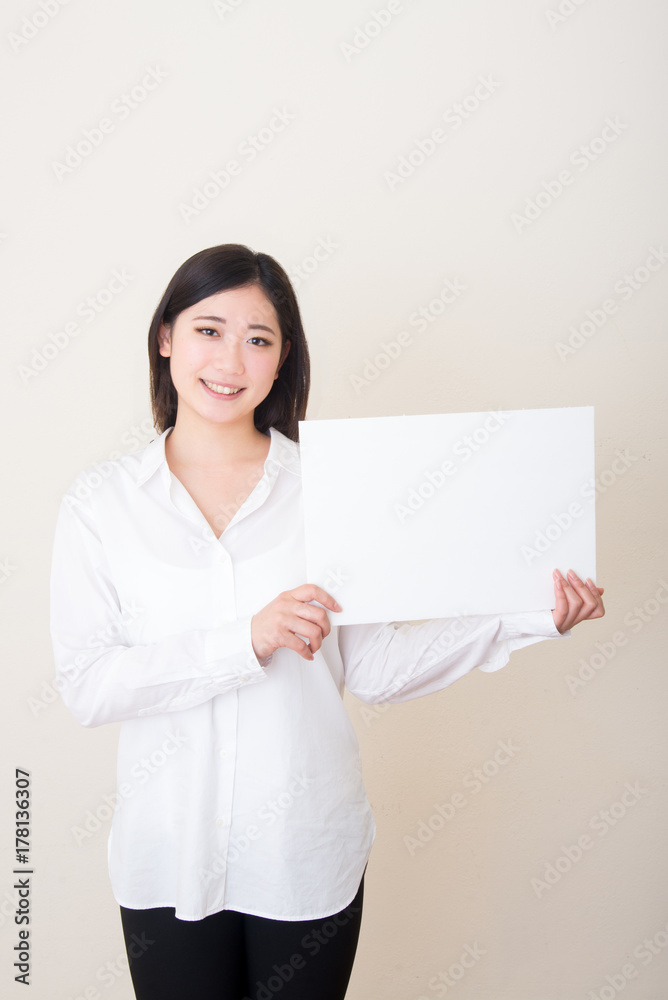 young asian woman with white board young asian woman with white board
