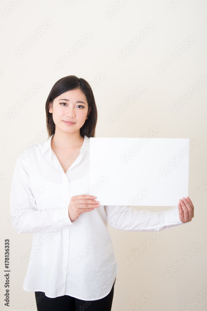 young asian woman with white board young asian woman with white board