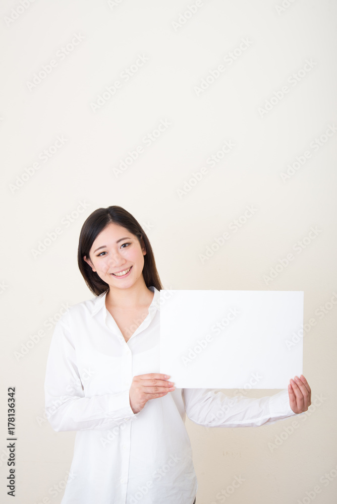 young asian woman with white board young asian woman with white board