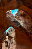 blue sky through the natural arches in Spooky Slot Canyon
Hole in the Rock Road, Grand Staircase Escalante National Monument, Garfield County, Utah, USA