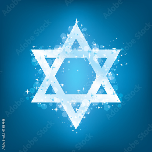 A sparkling white Star of David with bokeh effect on a glowing blue background for Hanukkah