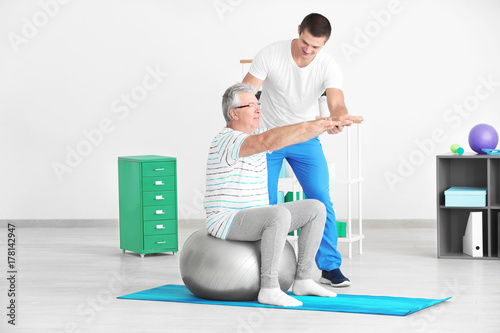 Physiotherapist working wit...