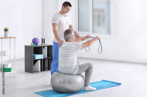 Physiotherapist working wit...
