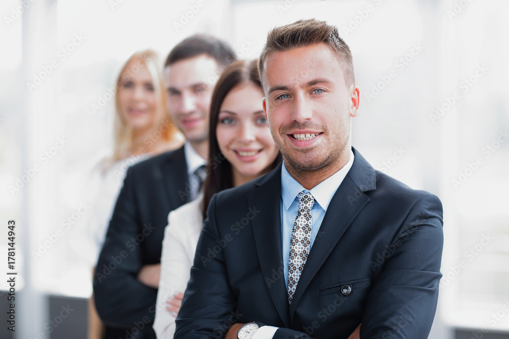 closeup. leader standing in front of the business team closeup. leader standing in front of the business team