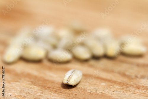 Fototapeta Naklejka Na Ścianę i Meble -  Pearl barley seeds. Closeup photo for background.