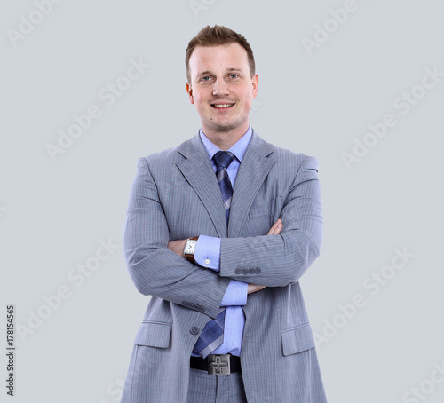 Quadro su tela Young manager smiling isolated on gray background