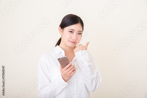 young asian woman using smart phone