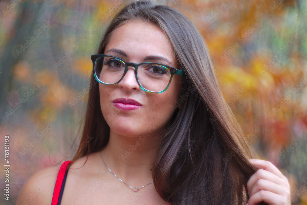 portrait of a young woman wearing glasses portrait of a young woman wearing glasses