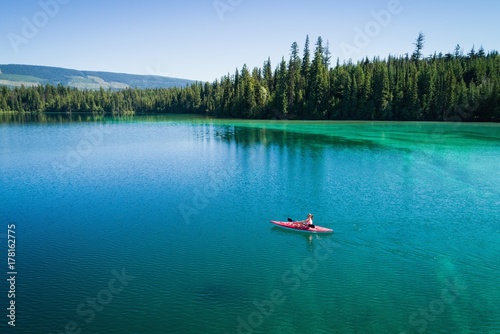 Man kayaking in lake
