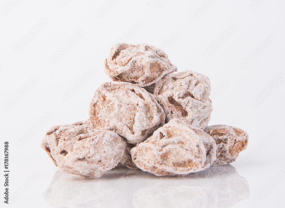 Salted Plum Tamarind Food Snack on a Background Salted Plum Tamarind Food Snack on a Background