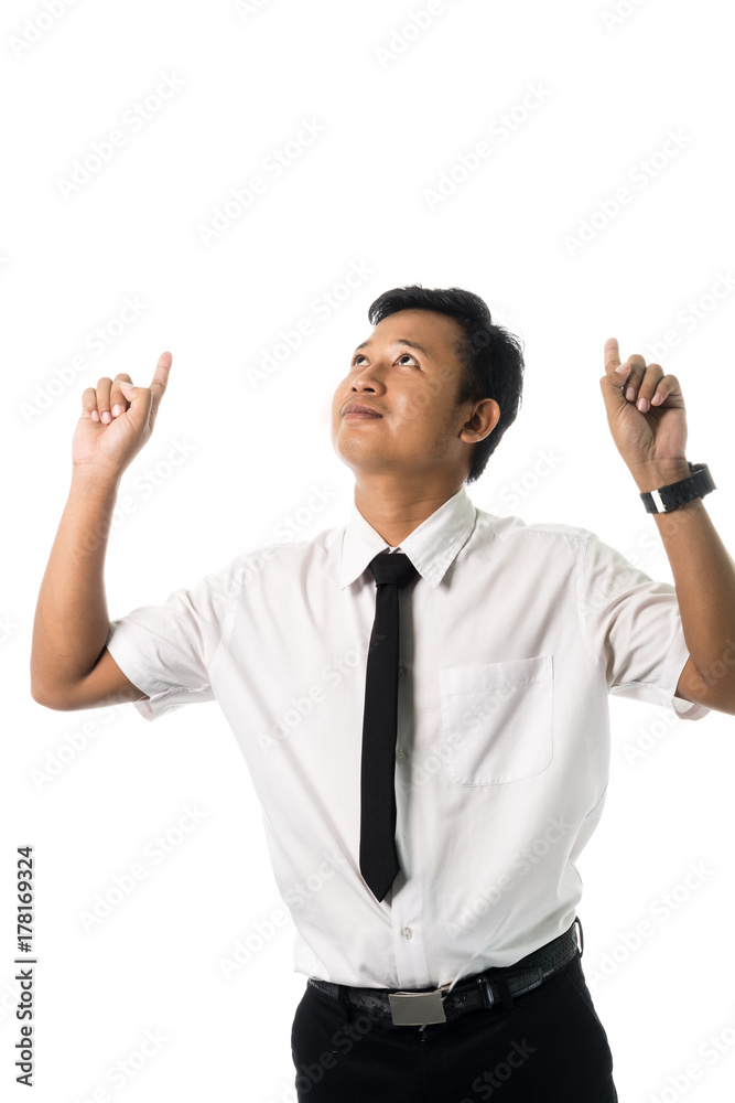 Portrait of a businessman pointed the finger to above. Isolated on white background with copy space Portrait of a businessman pointed the finger to above. Isolated on white background with copy space