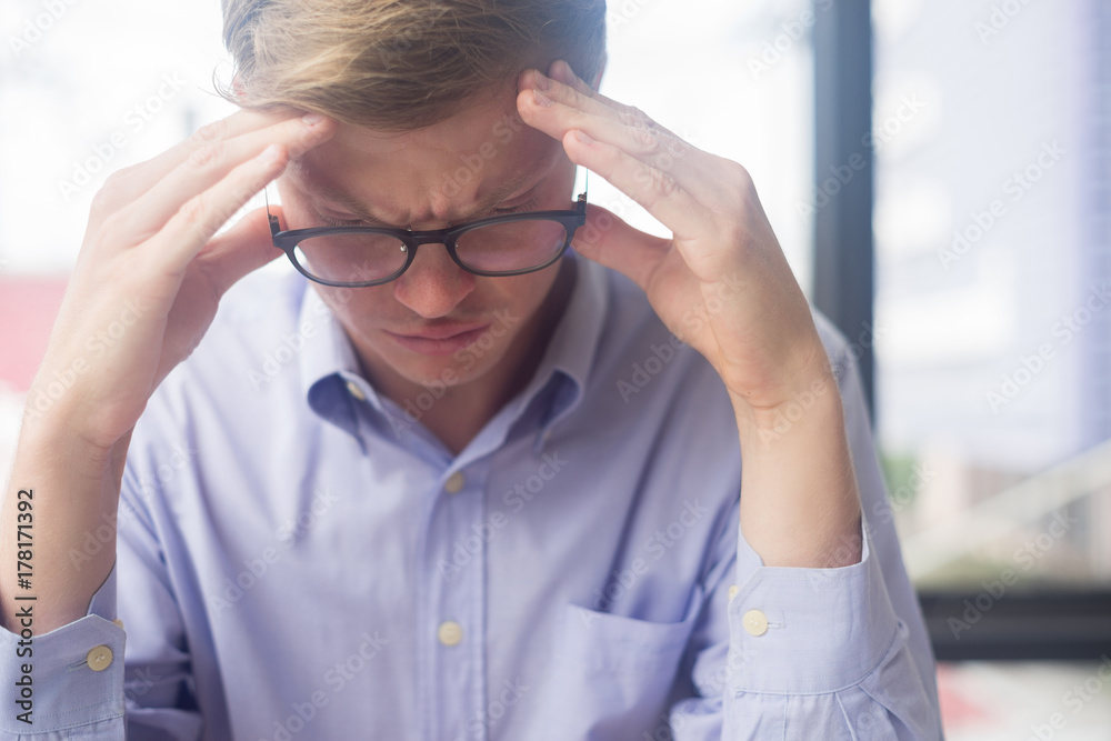 smart businessman at workplace tired and worried in office smart businessman at workplace tired and worried in office