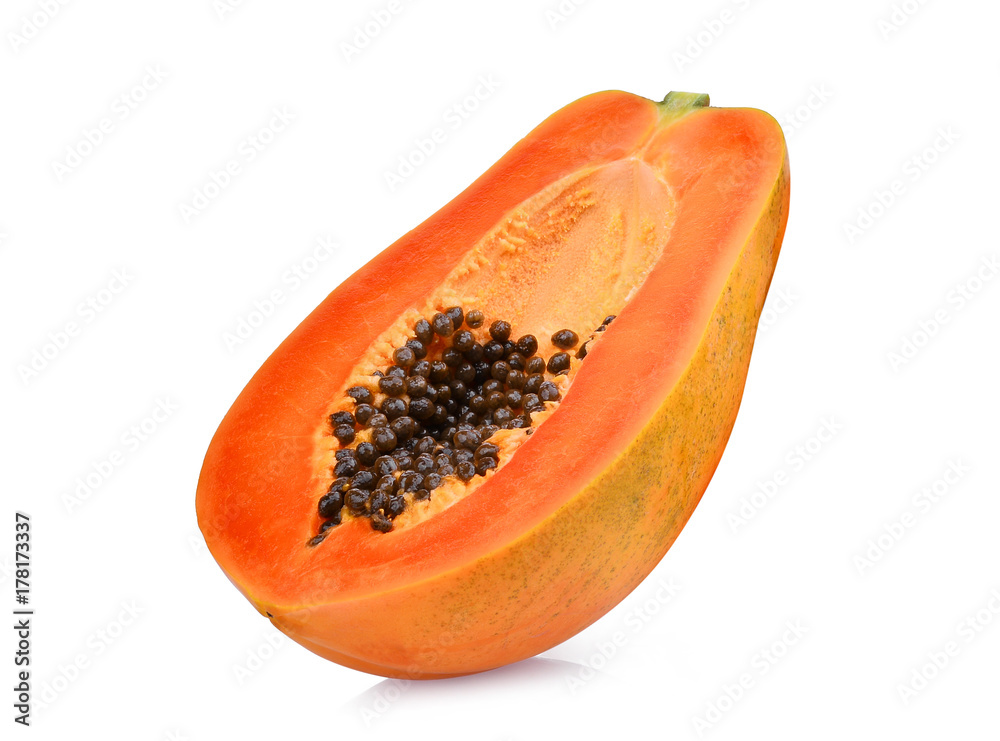 half of ripe papaya fruit with seeds isolated on white background half of ripe papaya fruit with seeds isolated on white background