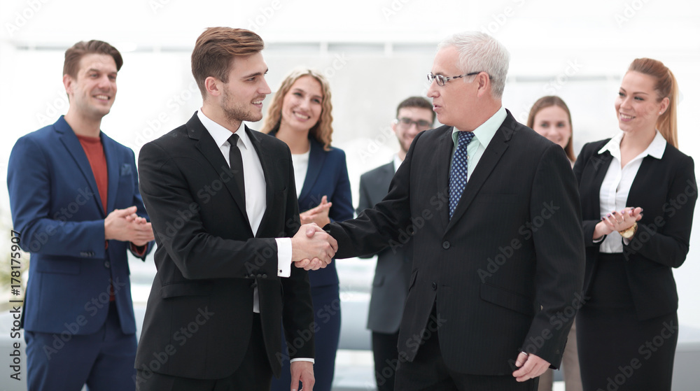 handshake of business partners after a business conference handshake of business partners after a business conference