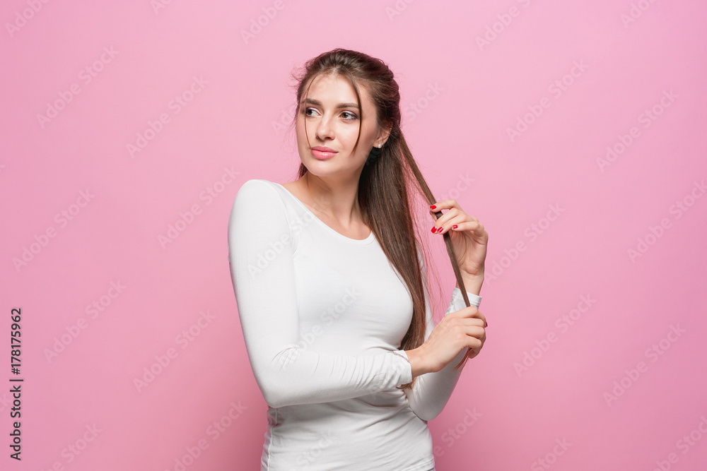 The young woman's portrait with thoughtful emotions The young woman's portrait with thoughtful emotions