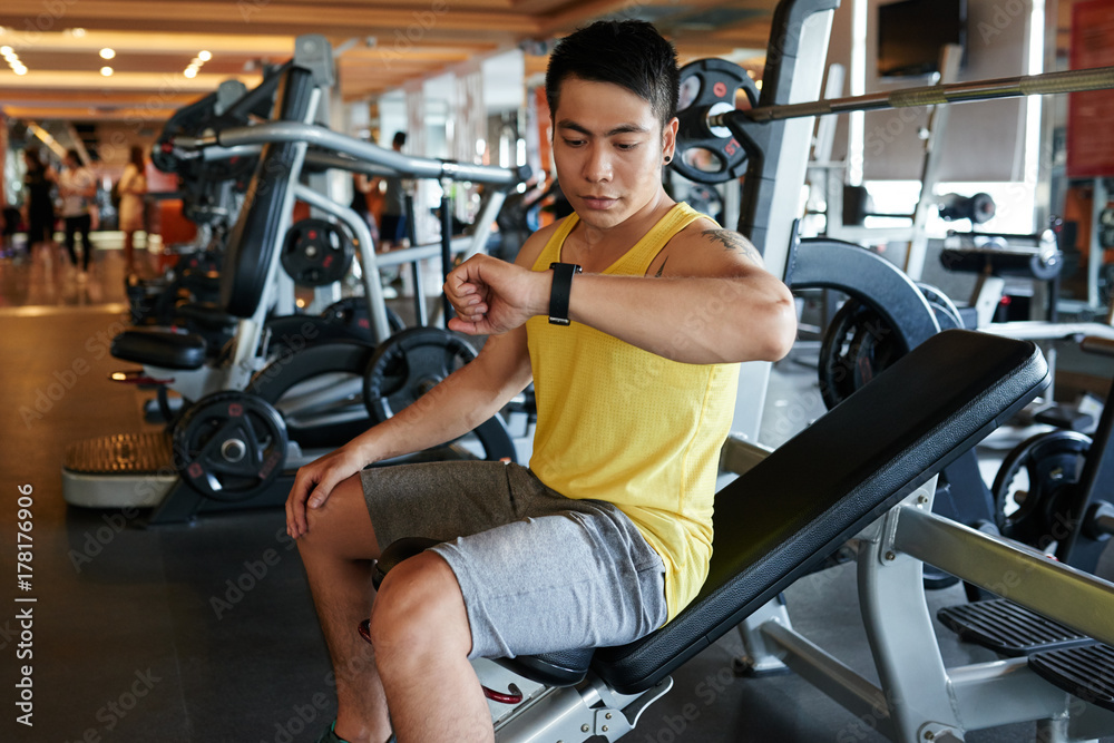 Checking fitness tracker Checking fitness tracker