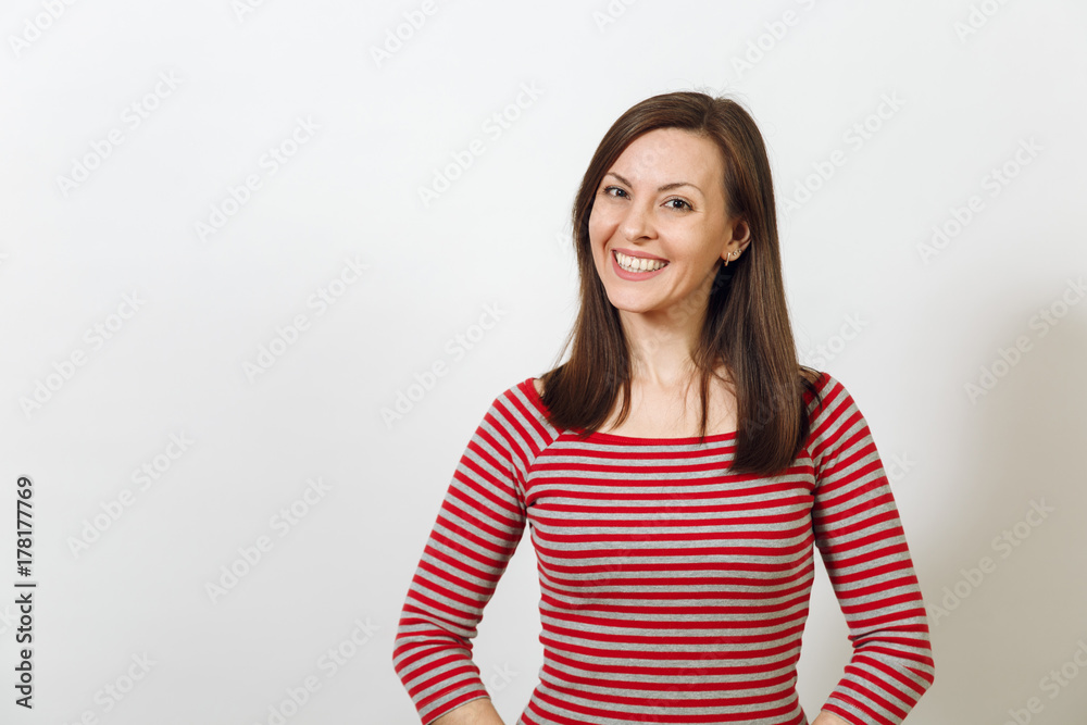 Gorgeous European young happy brown-haired woman with healthy clean skin and charming smile, dressed in casual red and grey clothes, laughing and enjoying on a white background. Emotions concept. Gorgeous European young happy brown-haired woman with healthy clean skin and charming smile, dressed in casual red and grey clothes, laughing and enjoying on a white background. Emotions concept.