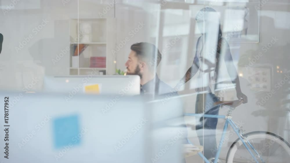 Cheerful creative design team working together in modern office. Cheerful creative design team working together in modern office.
