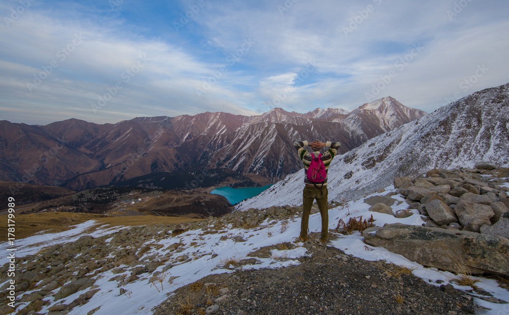 the traveler looks at the mountains.Kazakhstan, Almaty