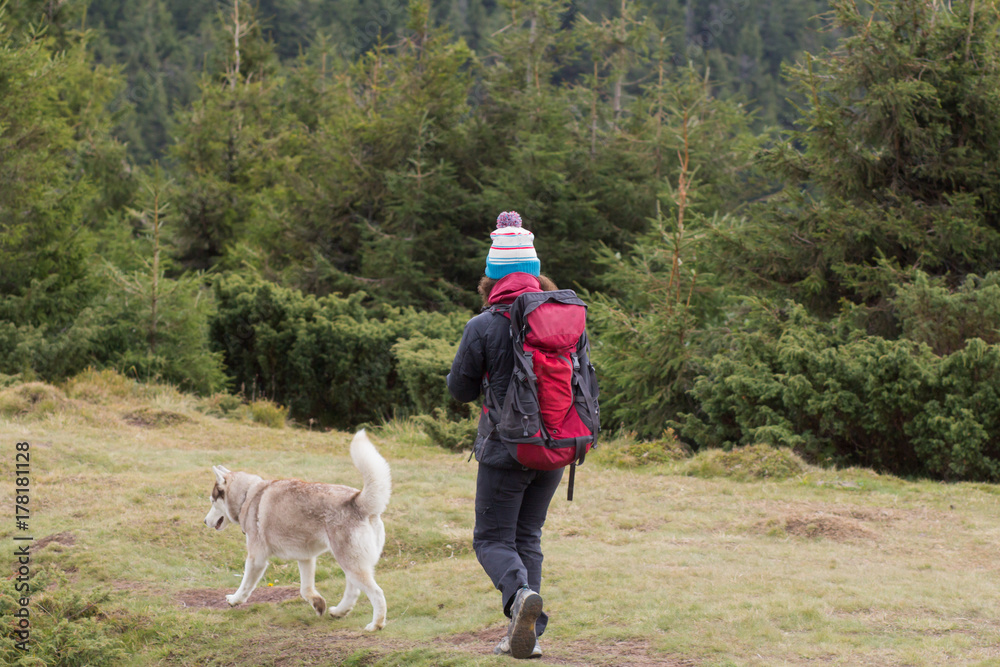 young woman hiker in autumn forest young woman hiker in autumn forest