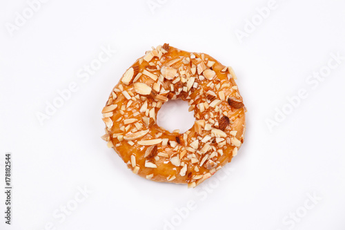 Delicious donut with almond caramel glazed, Isolated on white background.