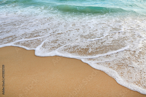 Background of sea wave and sand beach.